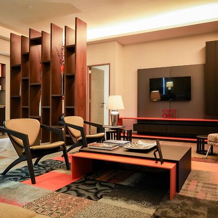 Metria Hotel Leon Bagian luar foto The interior of the lounge