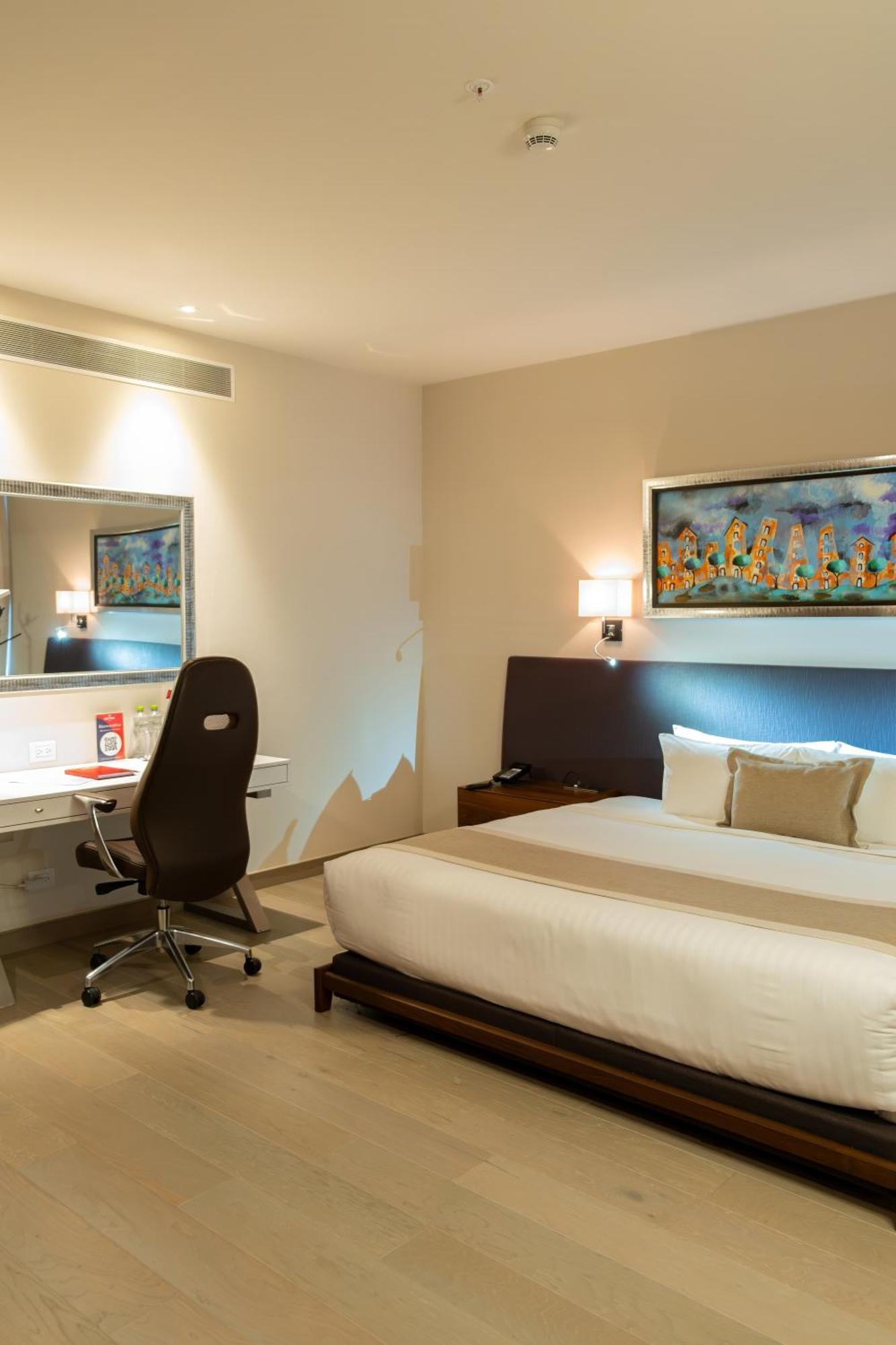 Metria Hotel Leon Bagian luar foto A room at the hotel