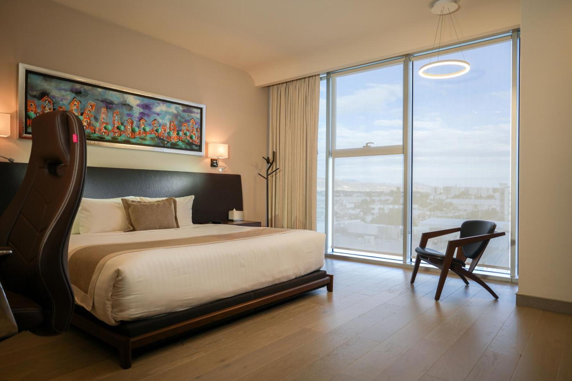 Metria Hotel Leon Bagian luar foto A bedroom at the hotel